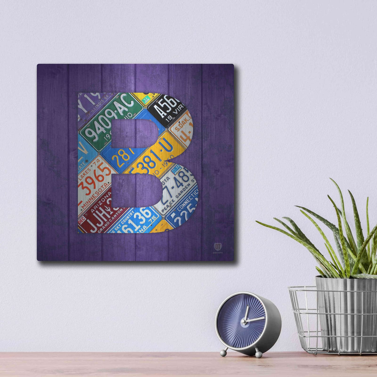 'B' by Design Turnpike – Metal Wall Art, 12x12 room view