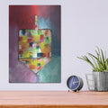 'Dreidel of Many Colors' by Linda Woods – Metal Wall Art, 12x16 room view