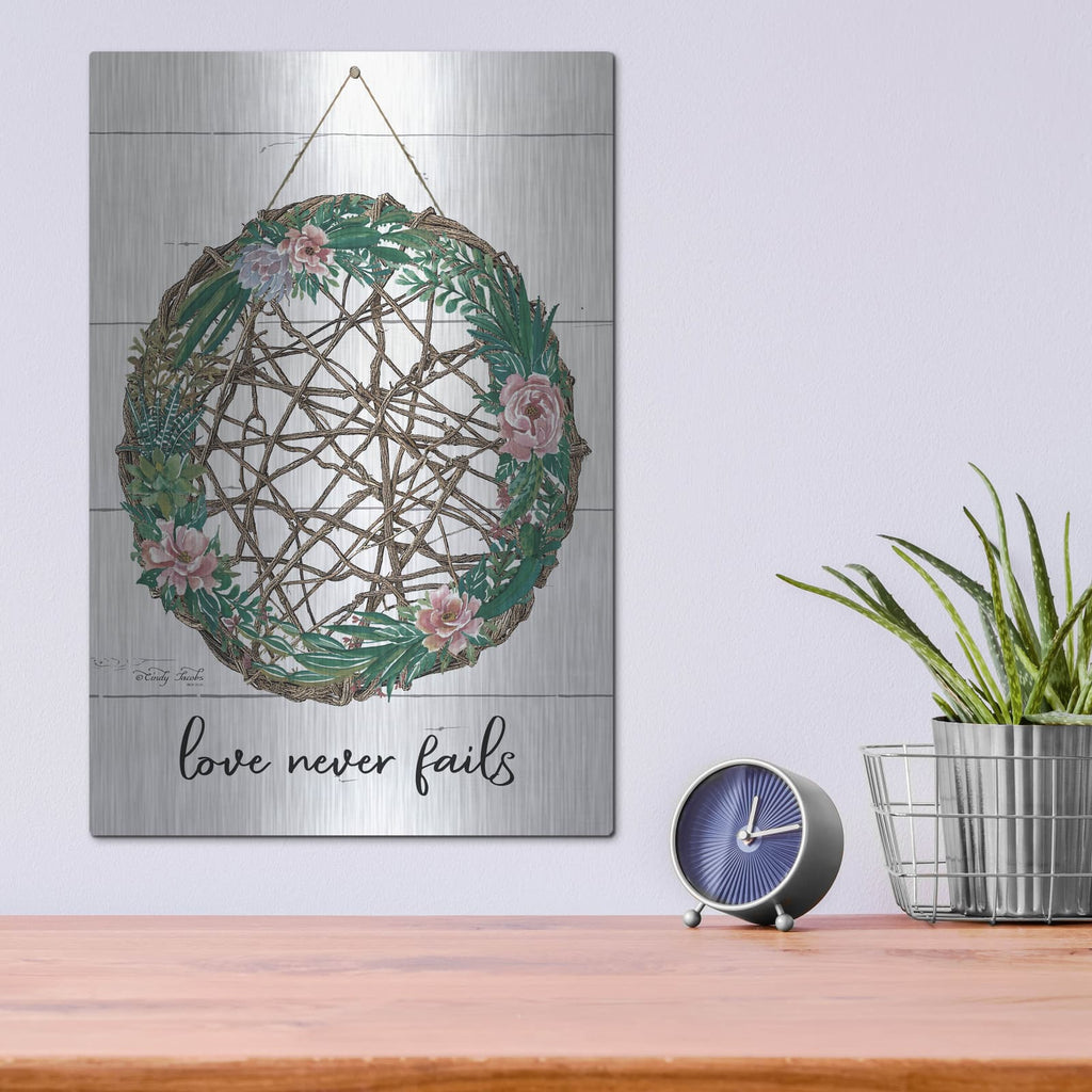 'Love Never Fails 3' by Cindy Jacobs – Metal Wall Art, 12x16 room view