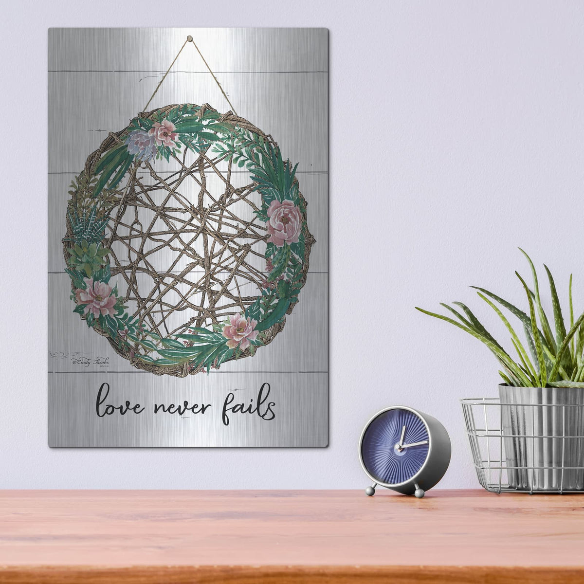 'Love Never Fails 3' by Cindy Jacobs – Metal Wall Art, 12x16 room view